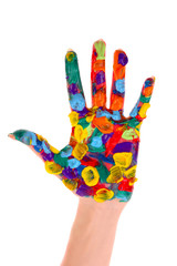 Painted woman hand in colorful paints isolated on white