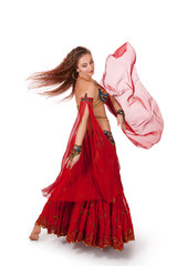 Young belly dancer dancing a turn