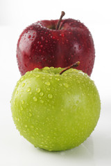 drop water on red and green apple