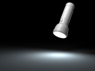 white flashlight lighting on black surface
