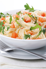 Pasta with tomato and rucola