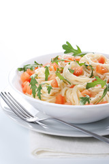 Pasta with tomato and rucola