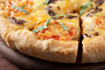 Pizza with mushroom and tomatoes