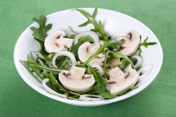 Salad with rucola and mushrooms
