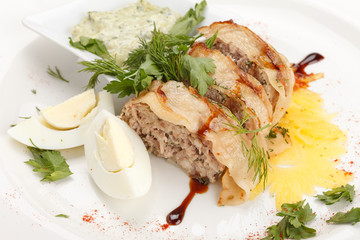 meat pie with egg and sauce