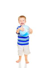Cute little boy with blue ball