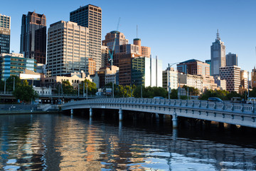 Fototapeta na wymiar Melbourne skyline and Queens Bridge across the Yarra River