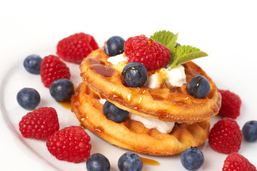 Belgian waffles with berries and cream