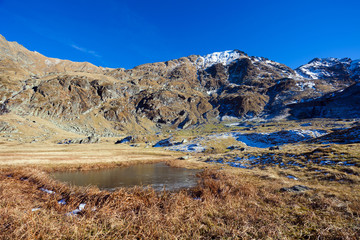 Fagaras mountains in the fall with blue sky