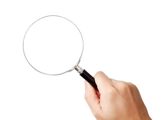 Man's hand, holding magnifying glass