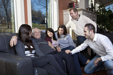 Family visiting elderly relative at a retirement home