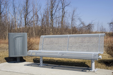 Public bench and trash can