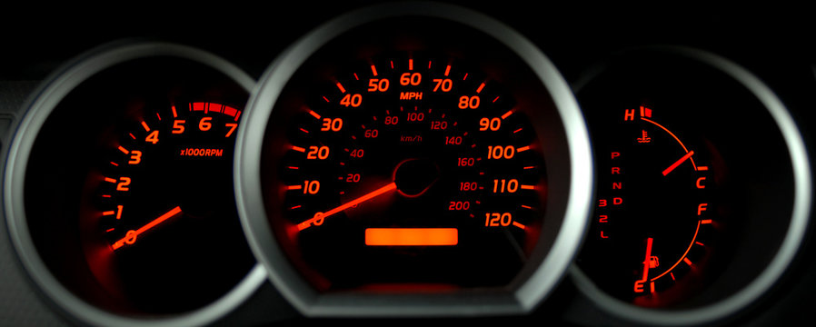 dashboard gauges lit at night