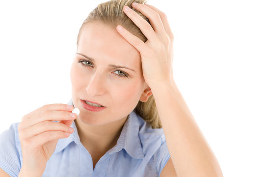 Young Woman With Headache, Migraine Take Pill