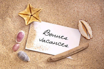 Message bonnes vacances, sable et coquillage