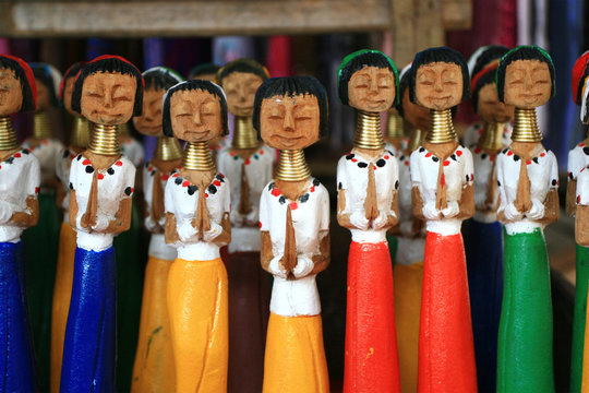 Wood carved girls of Northern Thailand
