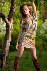 Beautiful young fashion woman posing outdoor