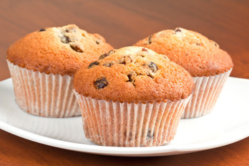 Muffins on a white plate