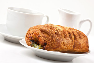 Breakfast: coffee and bun with cheese and spinach