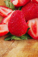 raw ripe strawberry on wood
