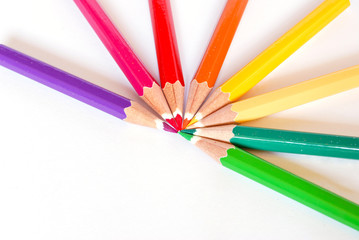 Naklejka premium color pencils on white background