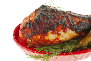 served roast chicken leg