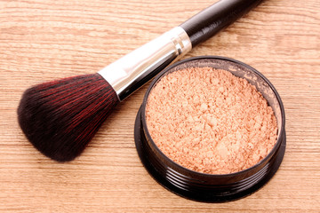 cosmetic brush and powder