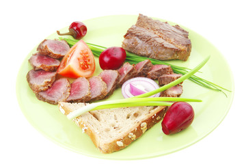 savory : meat served on green plate