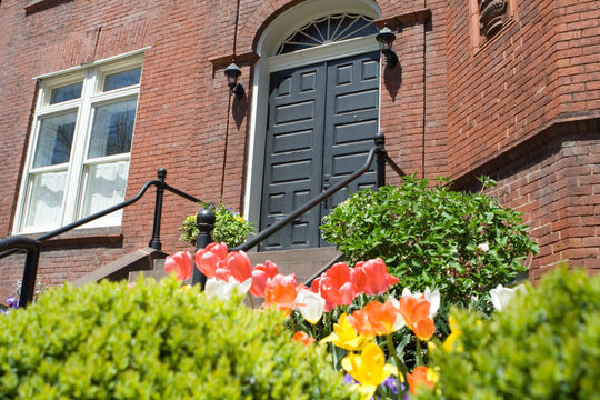 Brick Richardsonian Romanesque Row Home Spring