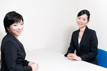 two businesswomen talking