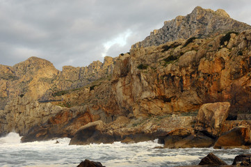 Fototapeta na wymiar Red rocks with grey skies