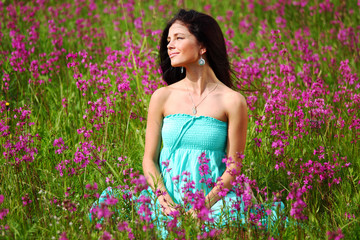 woman on pink flower field