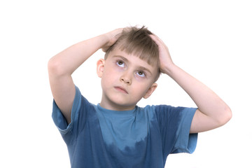 The boy clutched at the head