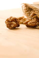 Walnut isolated on wooden background