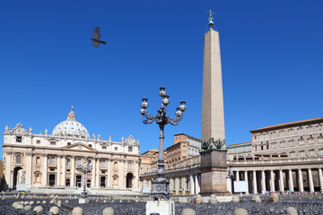 Fototapeta na wymiar Vatican Museum in Basilica of St. Peter and obelisk at day