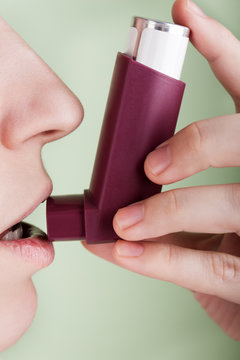 Women With Asthmatic Inhaler