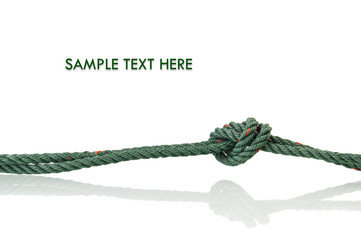 Tied rope on white background