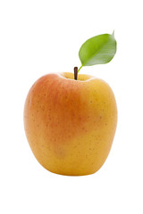 fresh yellow apple with green leaf