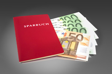 Sparbuch mit Banknoten