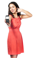 beautiful young woman in red dress with phone