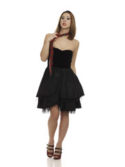 girl in little black dress looking displeased