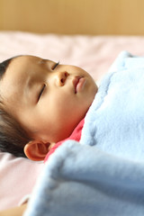 Obraz na płótnie Canvas 赤ちゃんの寝顔