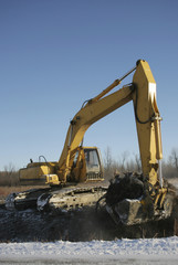 Excavator in action winter