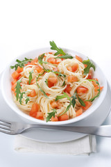 Pasta with tomato and rucola