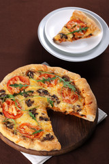 Pizza with mushroom and tomatoes