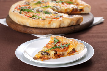 Pizza with mushroom and tomatoes