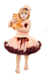 Portrait of the beautiful girl in a pink dress