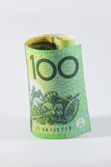 rolled up Australian 100 dollar note