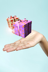 a woman hand with gift