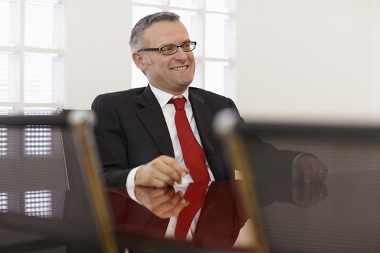 Businessman In Corporate Meeting